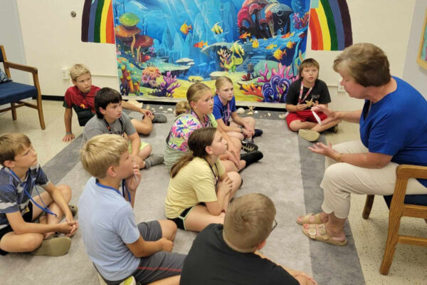 kids listening to a story at VBS